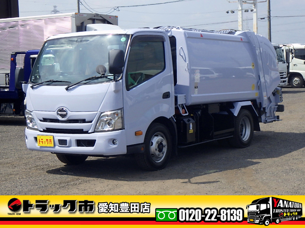 日野 デュトロ プレス式パッカー車 容積5.9立米 連続スイッチ 水ポンプ付