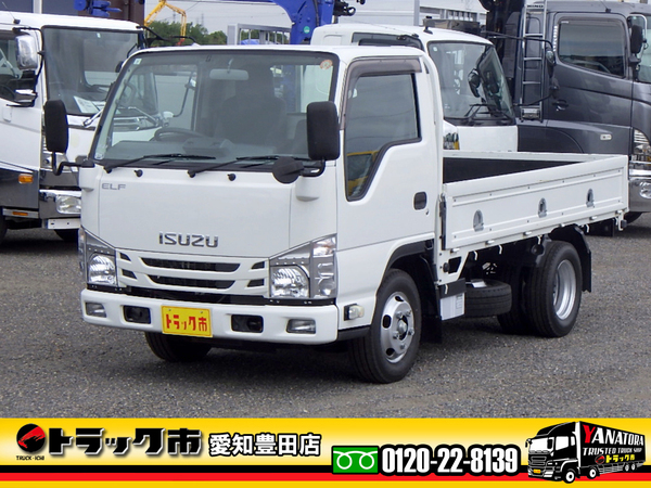 いすゞ エルフ 平ボディ 全低床 標準10尺 1550kg 衝突軽減ブレーキ AT