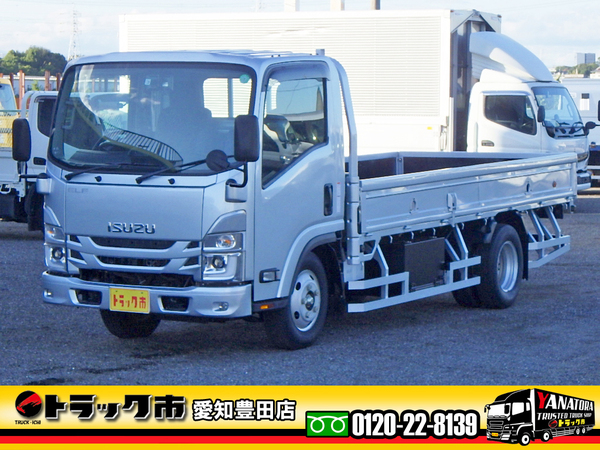 いすゞ エルフ 平ボディ 3t ハイキャブロング 全低床 AT ロープ穴2対